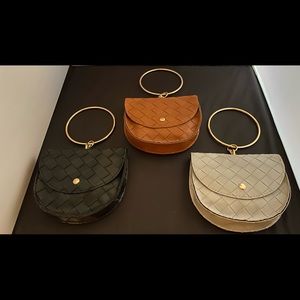 Bangle clutch purses